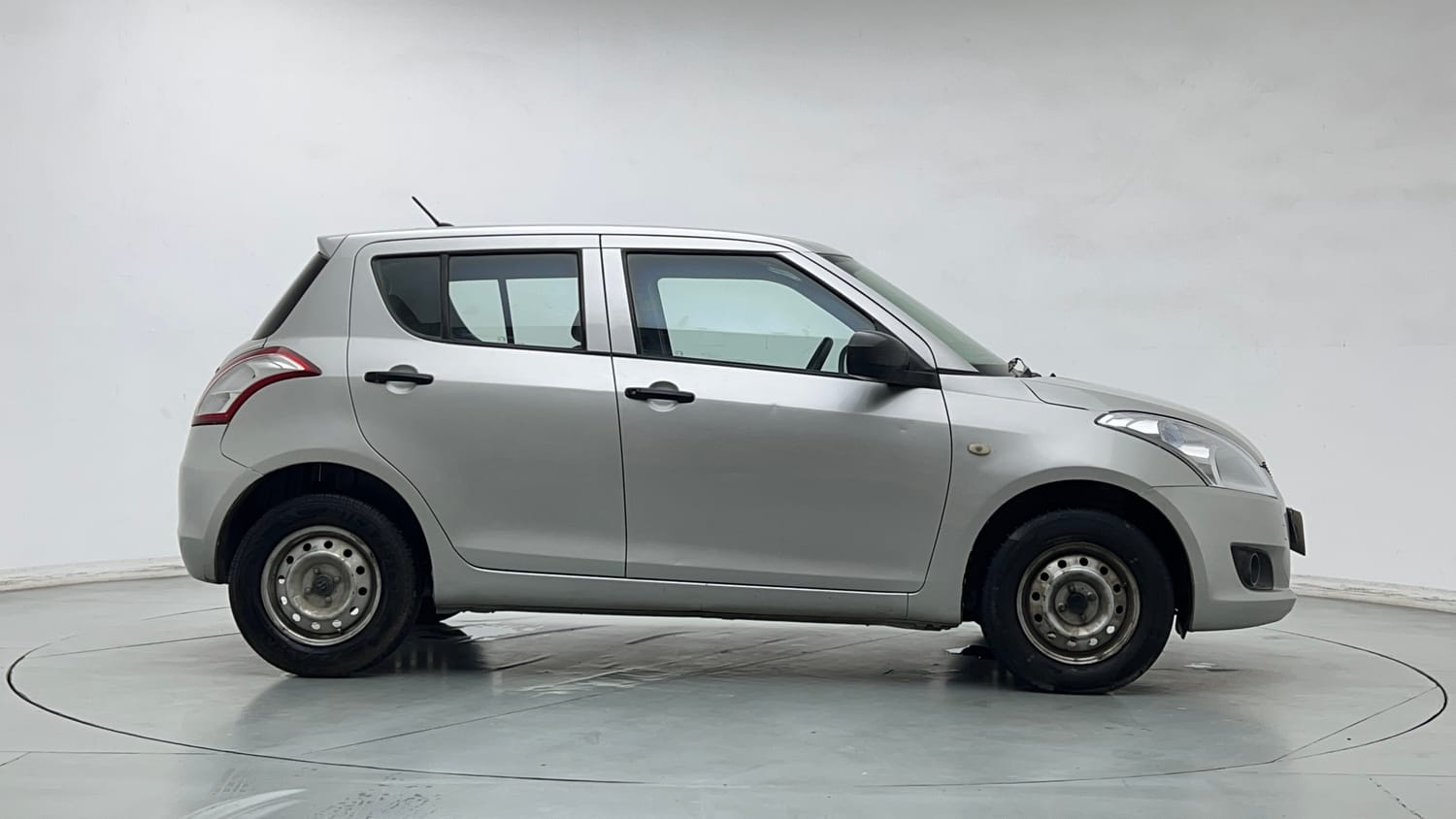 Used 2013 Maruti Suzuki Swift LXi Petrol Manual exterior RIGHT SIDE VIEW