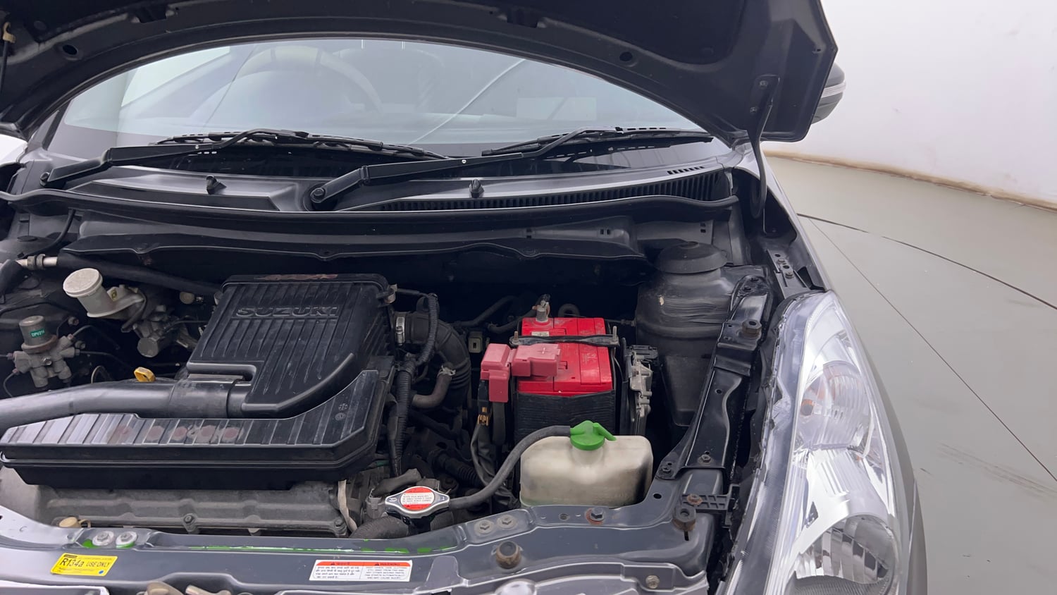 Used 2012 Maruti Suzuki Swift VXi Petrol Manual engine ENGINE LEFT SIDE HINGE & APRON VIEW