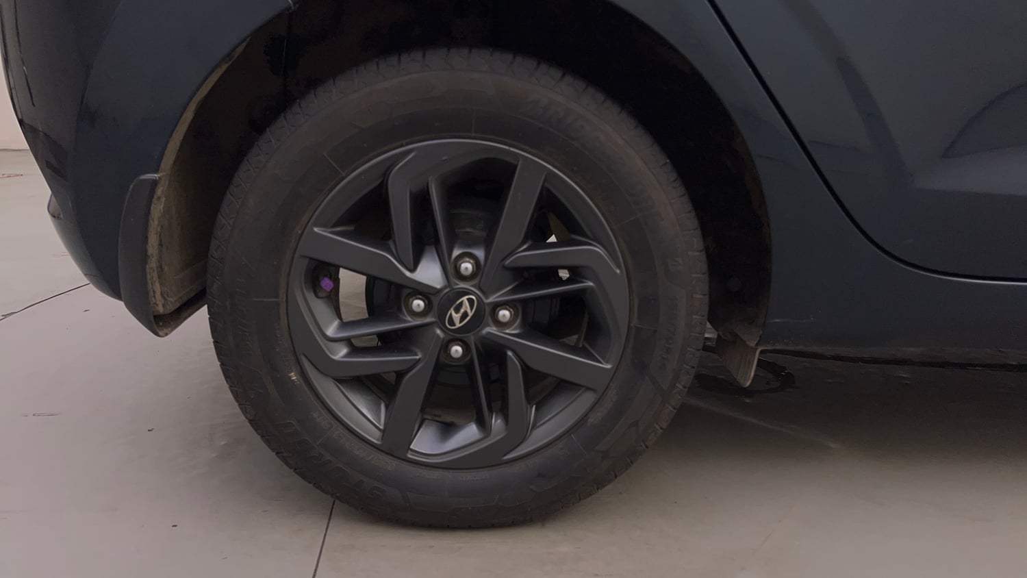 Used 2021 Hyundai Grand i10 Nios Sportz AMT 1.2 Kappa VTVT Petrol Automatic tyres RIGHT REAR TYRE RIM VIEW