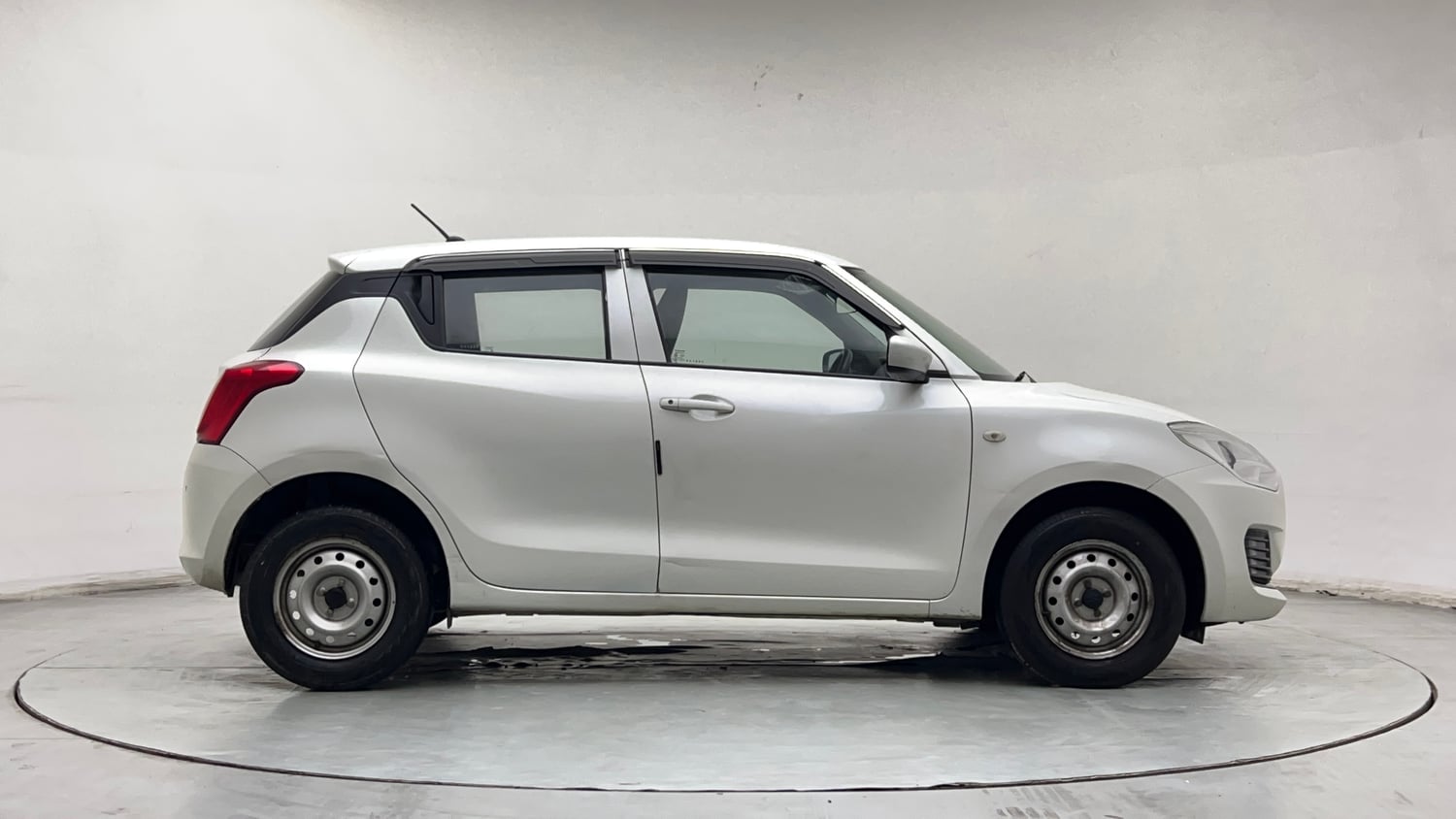 Used 2023 Maruti Suzuki Swift LXi Petrol Manual exterior RIGHT SIDE VIEW