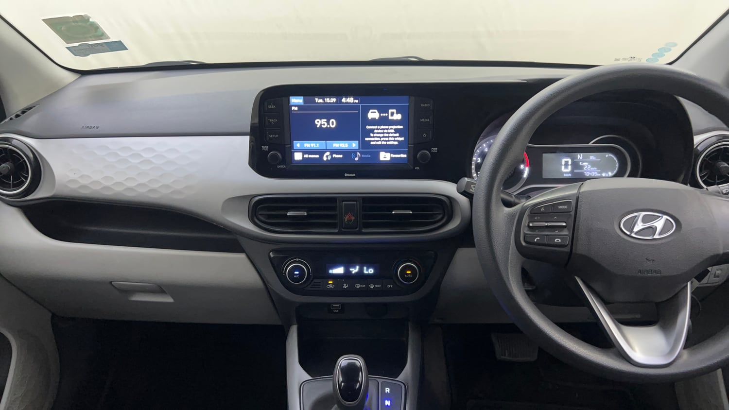 Used 2021 Hyundai Grand i10 Nios Sportz AMT 1.2 Kappa VTVT Petrol Automatic interior MUSIC SYSTEM & AC CONTROL VIEW