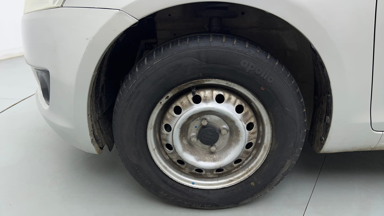 Used 2013 Maruti Suzuki Swift LXi Petrol Manual tyres LEFT FRONT TYRE RIM VIEW