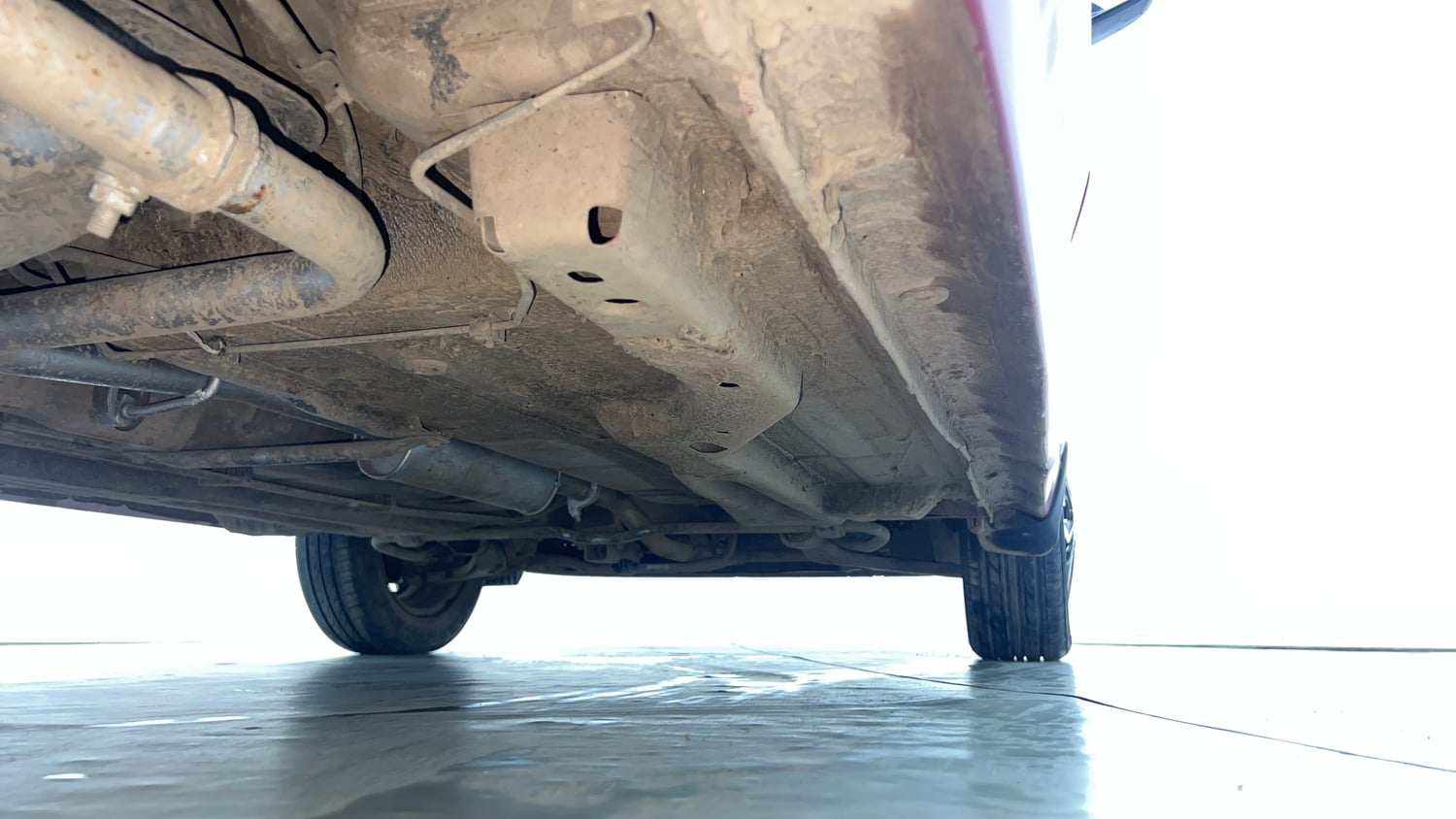 Used 2019 Tata Tiago Revotron XZ w/o Alloy Petrol Manual extra REAR RIGHT UNDERBODY VIEW