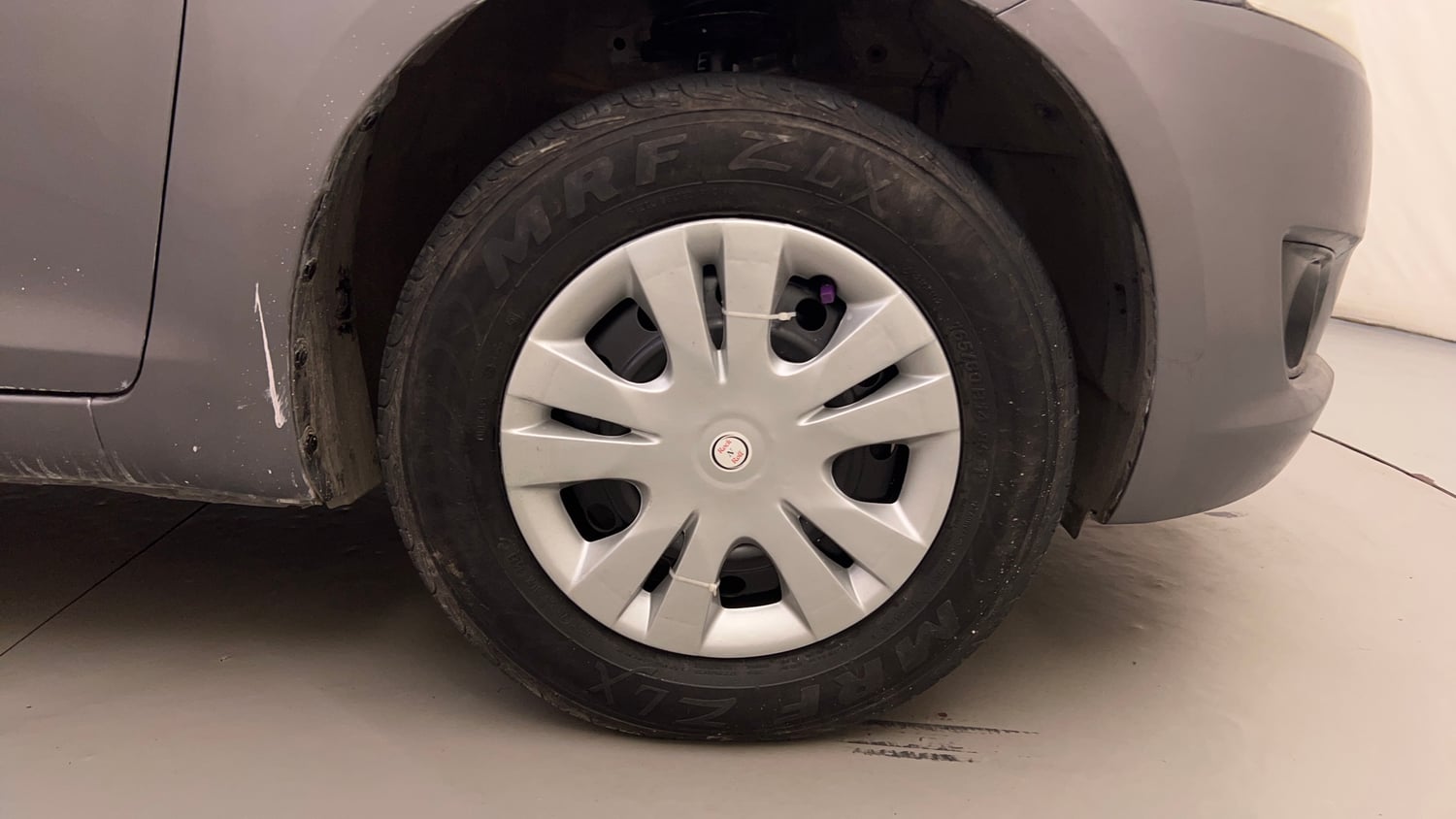 Used 2014 Maruti Suzuki Swift VXi Petrol Manual tyres RIGHT FRONT TYRE RIM VIEW