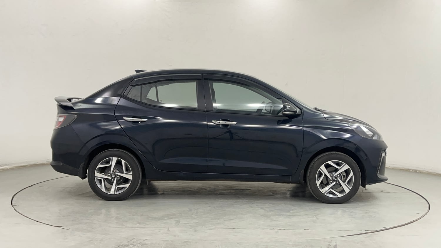 Used 2024 Hyundai Aura SX 1.2 CNG Cng Manual exterior RIGHT SIDE VIEW