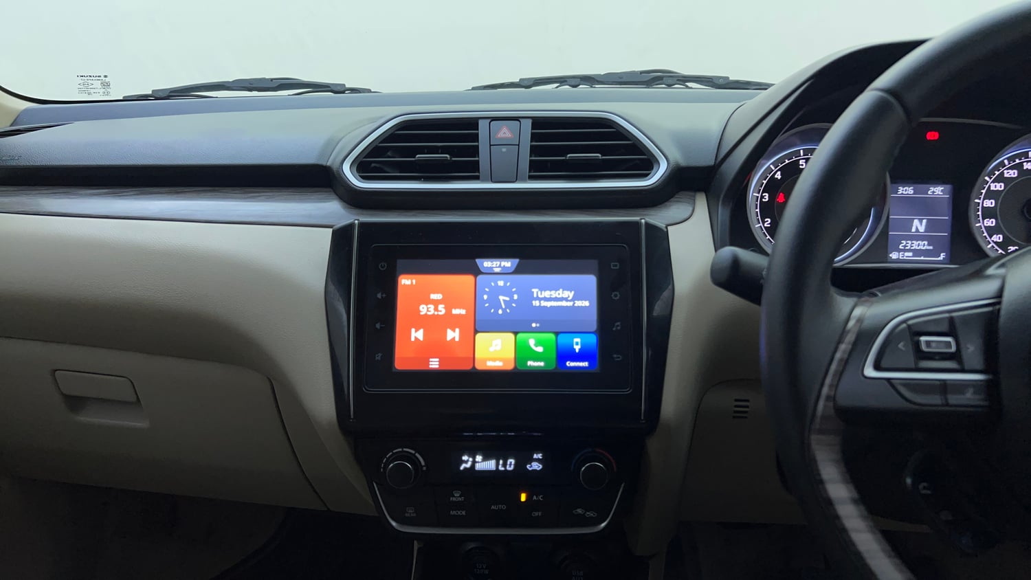 Used 2022 Maruti Suzuki Dzire ZXi AGS Petrol Automatic top_features Integrated (in-dash) music system