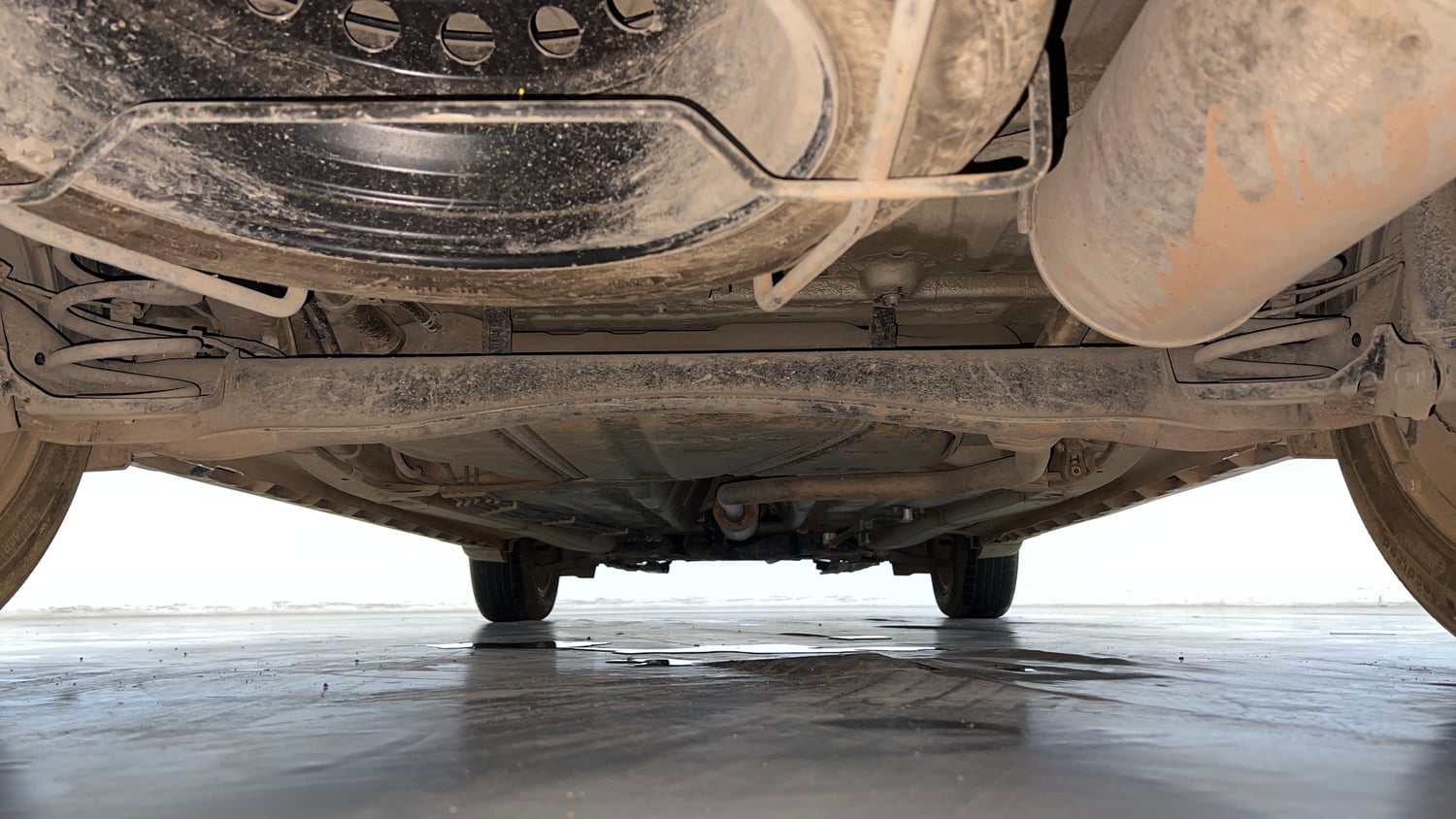 Used 2024 Maruti Suzuki XL6 Zeta MT CNG Cng Manual extra REAR UNDERBODY VIEW (TAKEN FROM REAR)