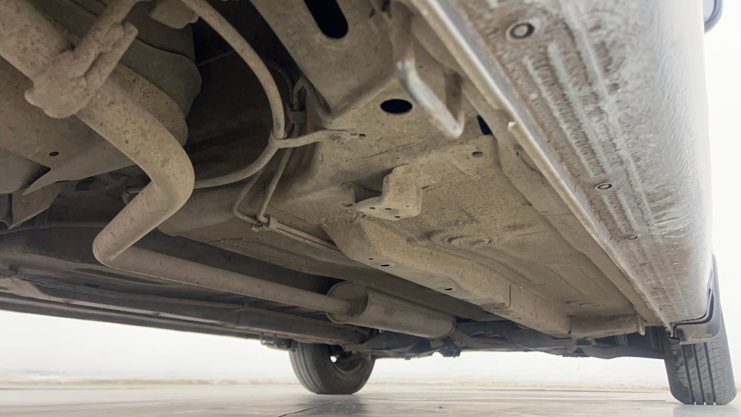 Used 2015 Maruti Suzuki Celerio VXi AMT Petrol Automatic extra REAR RIGHT UNDERBODY VIEW