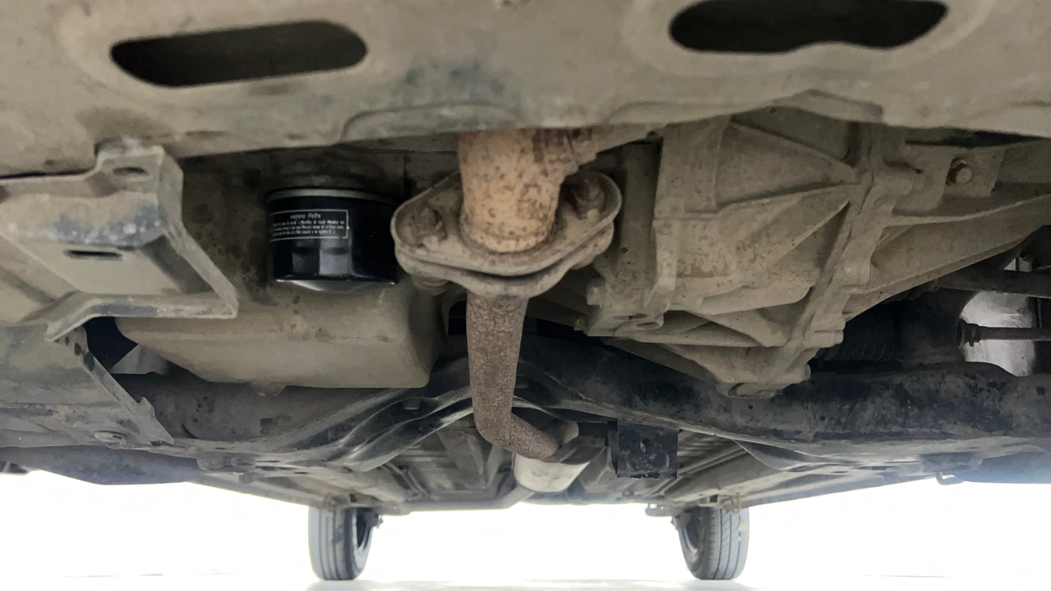 Used 2015 Maruti Suzuki Celerio VXi AMT Petrol Automatic extra FRONT LEFT UNDERBODY VIEW