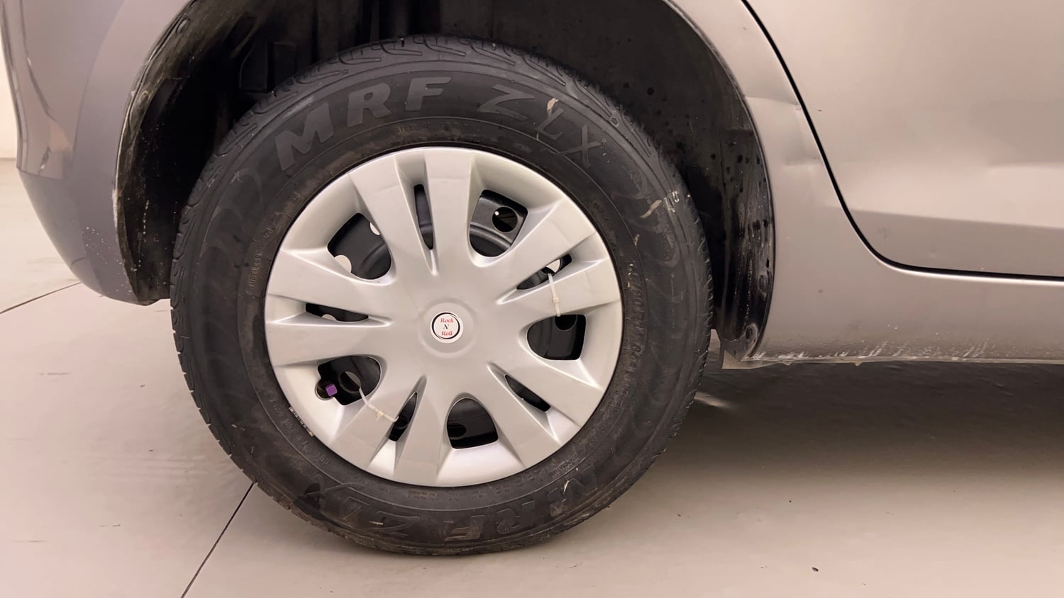 Used 2014 Maruti Suzuki Swift VXi Petrol Manual tyres RIGHT REAR TYRE RIM VIEW