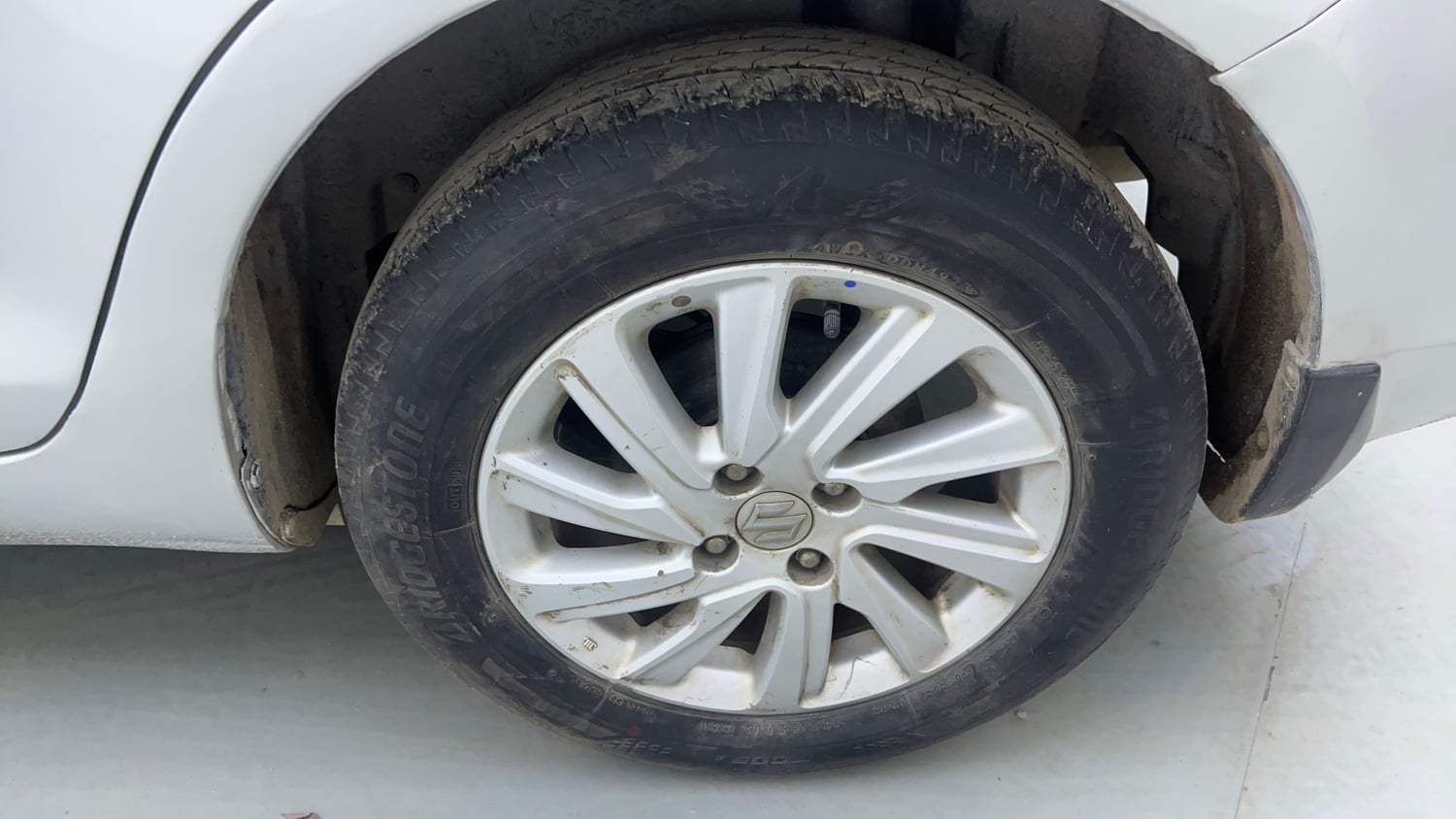 Used 2015 Maruti Suzuki Swift Dzire ZXI Petrol Manual tyres LEFT REAR TYRE RIM VIEW
