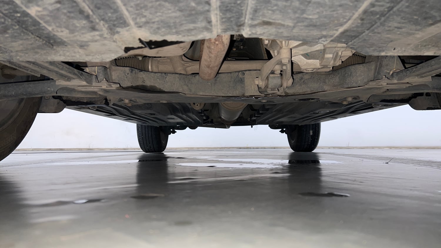 Used 2024 Maruti Suzuki Grand Vitara Delta CNG Cng Manual extra FRONT LEFT UNDERBODY VIEW