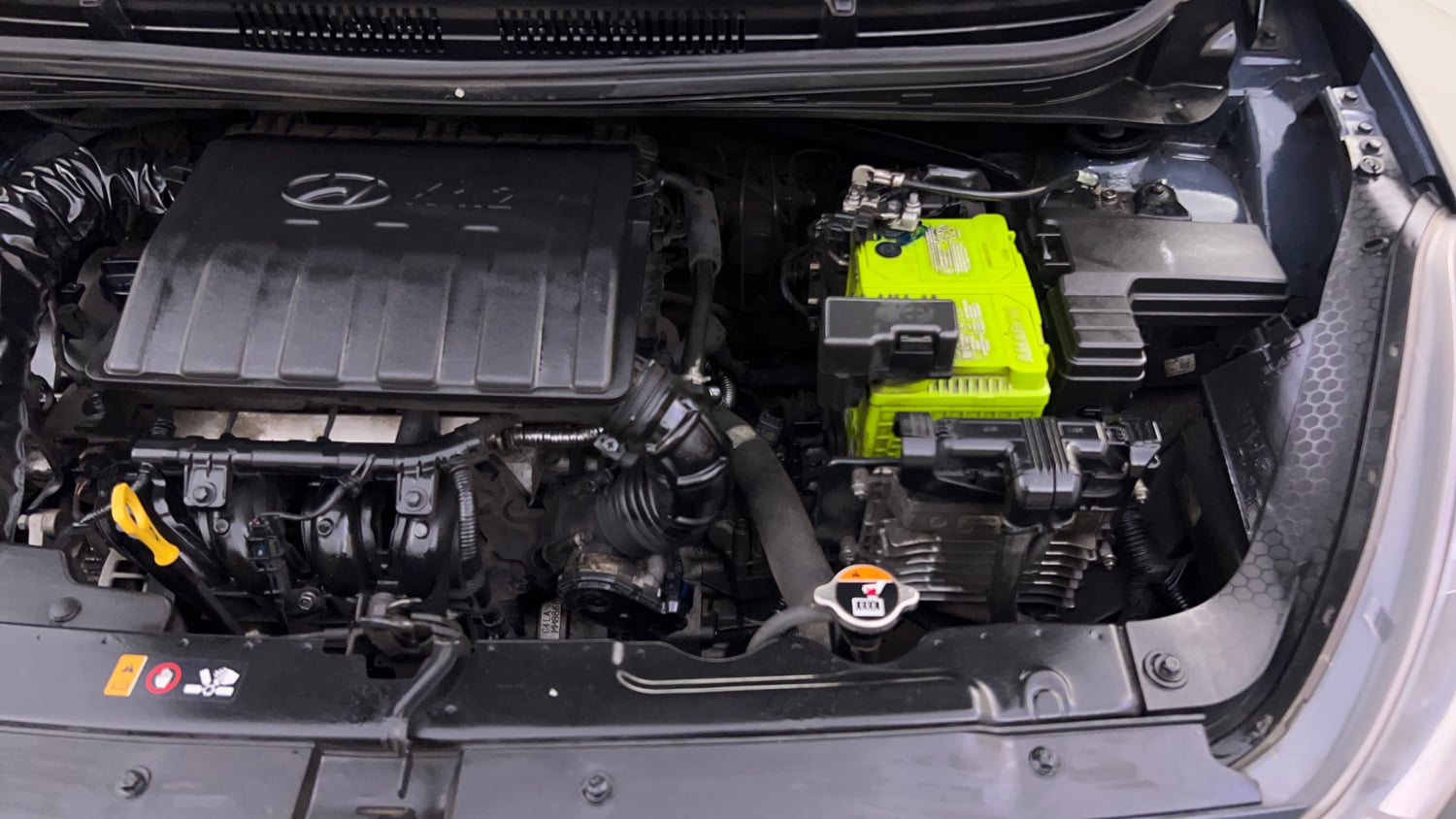 Used 2021 Hyundai Grand i10 Nios Sportz AMT 1.2 Kappa VTVT Petrol Automatic engine ENGINE LEFT SIDE VIEW