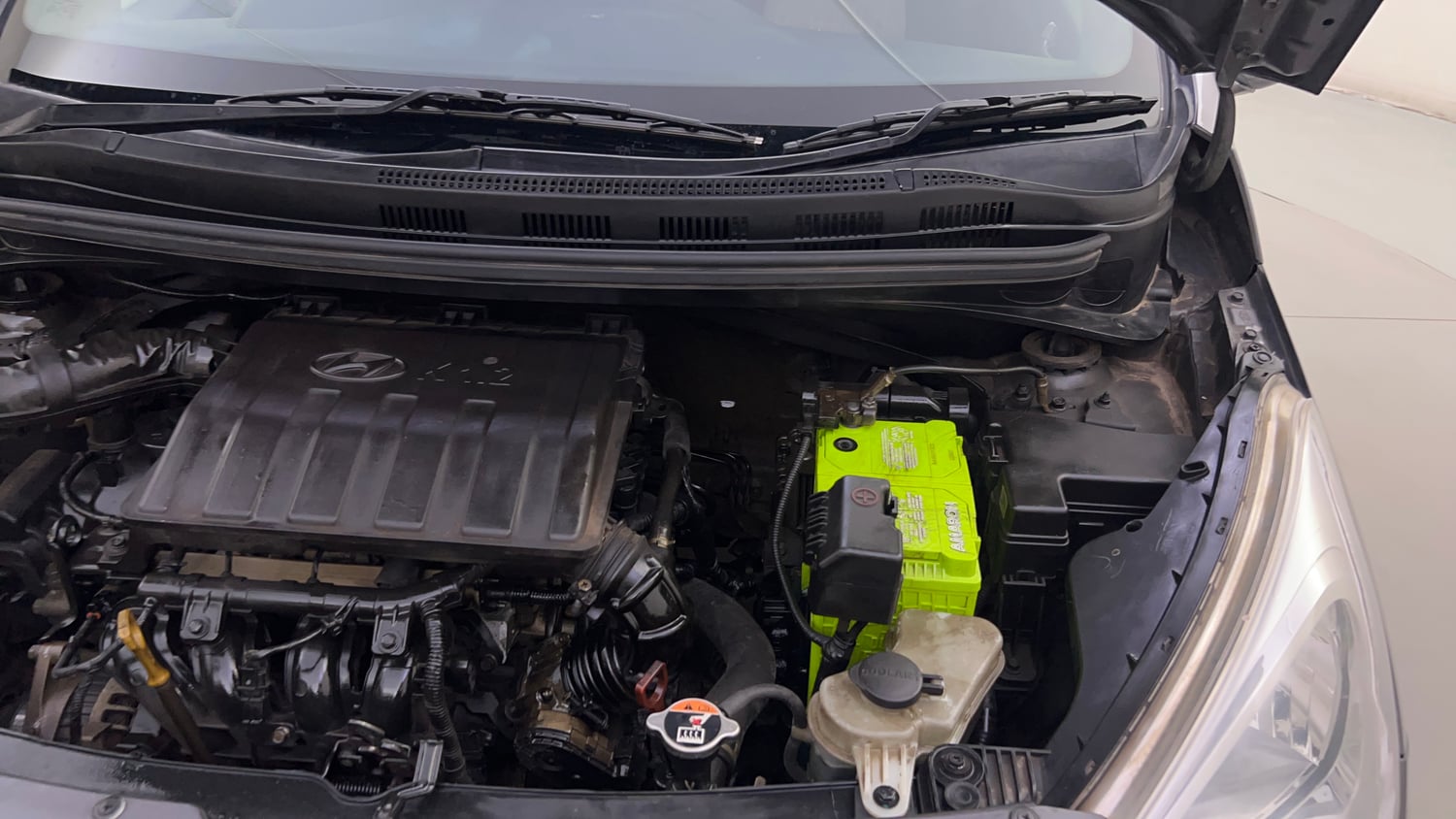 Used 2017 Hyundai Grand i10 Sportz (O) AT 1.2 Kappa VTVT Petrol Automatic engine ENGINE LEFT SIDE HINGE & APRON VIEW