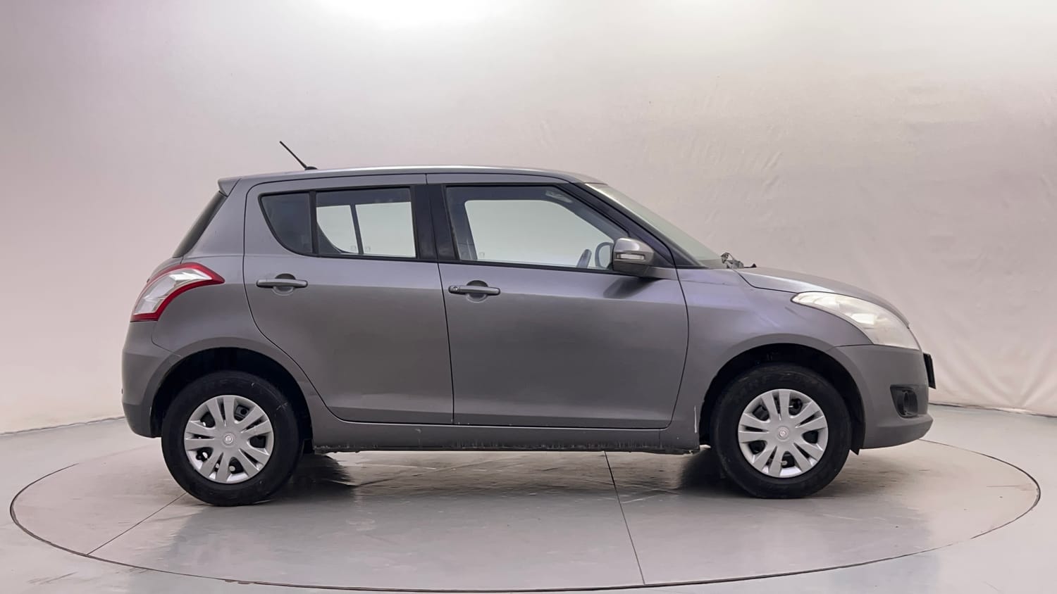 Used 2014 Maruti Suzuki Swift VXi Petrol Manual exterior RIGHT SIDE VIEW