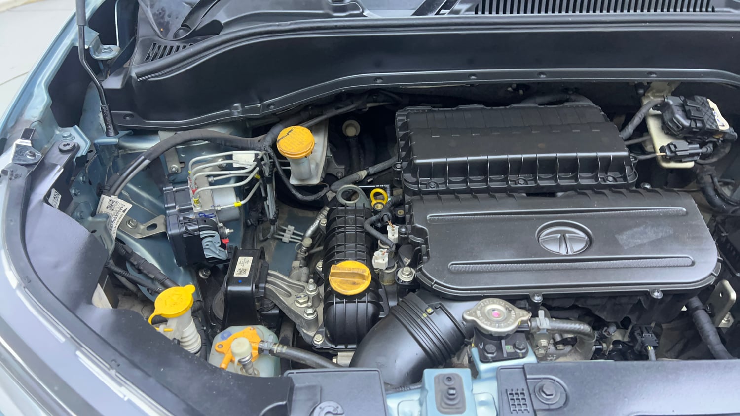 Used 2023 Tata Punch Creative IRA AMT Dual Tone Petrol Automatic engine ENGINE RIGHT SIDE VIEW