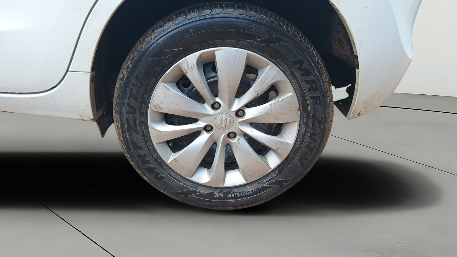 Used 2017 Maruti Suzuki Baleno Delta 1.2 Petrol Manual tyres LEFT REAR TYRE RIM VIEW
