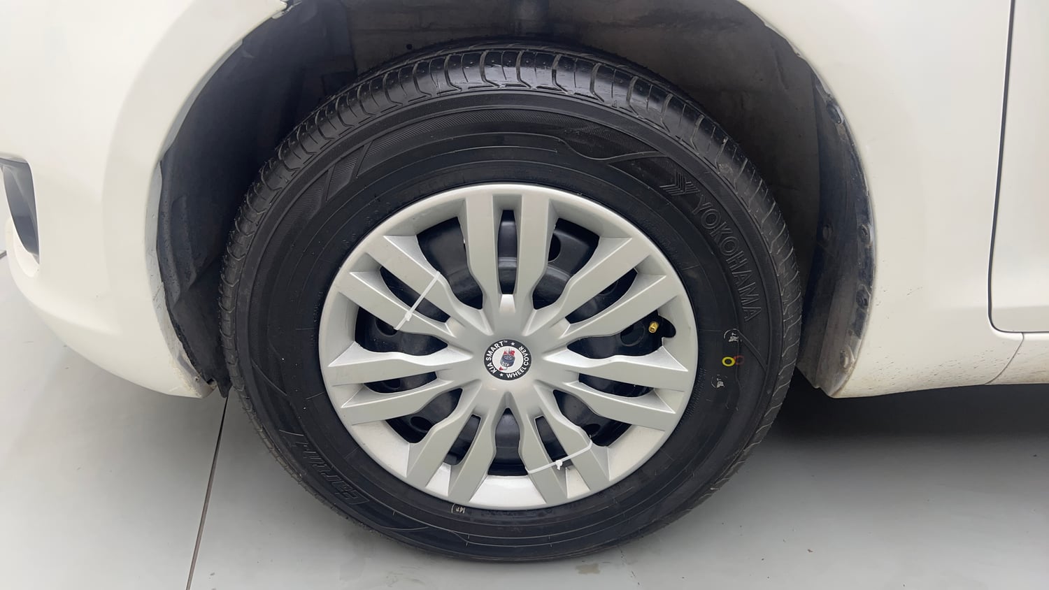 Used 2014 Maruti Suzuki Swift VXi Petrol Manual tyres LEFT FRONT TYRE RIM VIEW