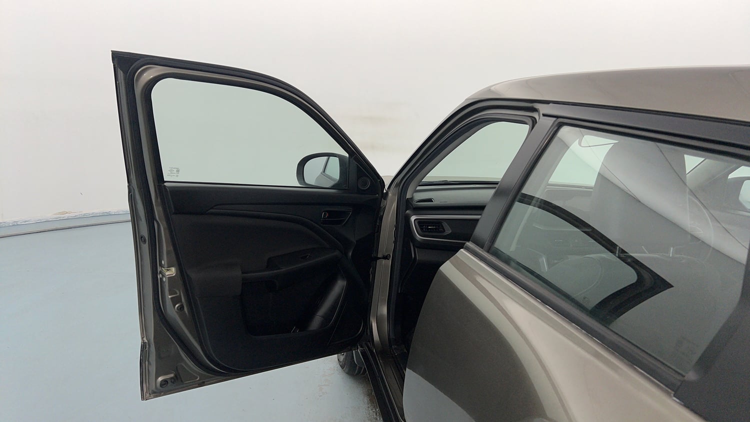 Used 2025 Maruti Suzuki Brezza VXi Petrol Manual interior LEFT FRONT DOOR OPEN VIEW