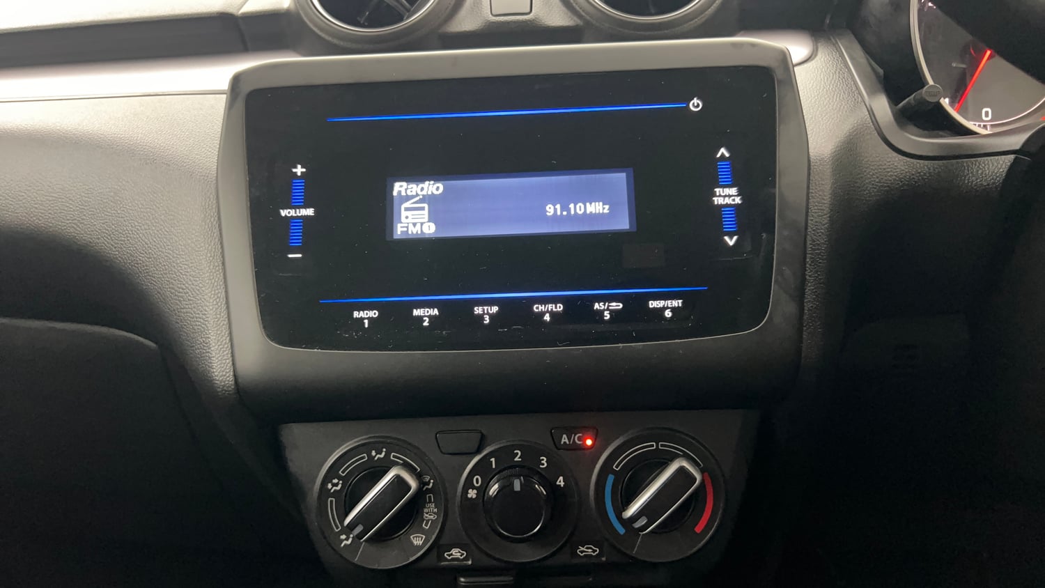 Used 2023 Maruti Suzuki Swift VXi Petrol Manual interior MUSIC SYSTEM & AC CONTROL VIEW