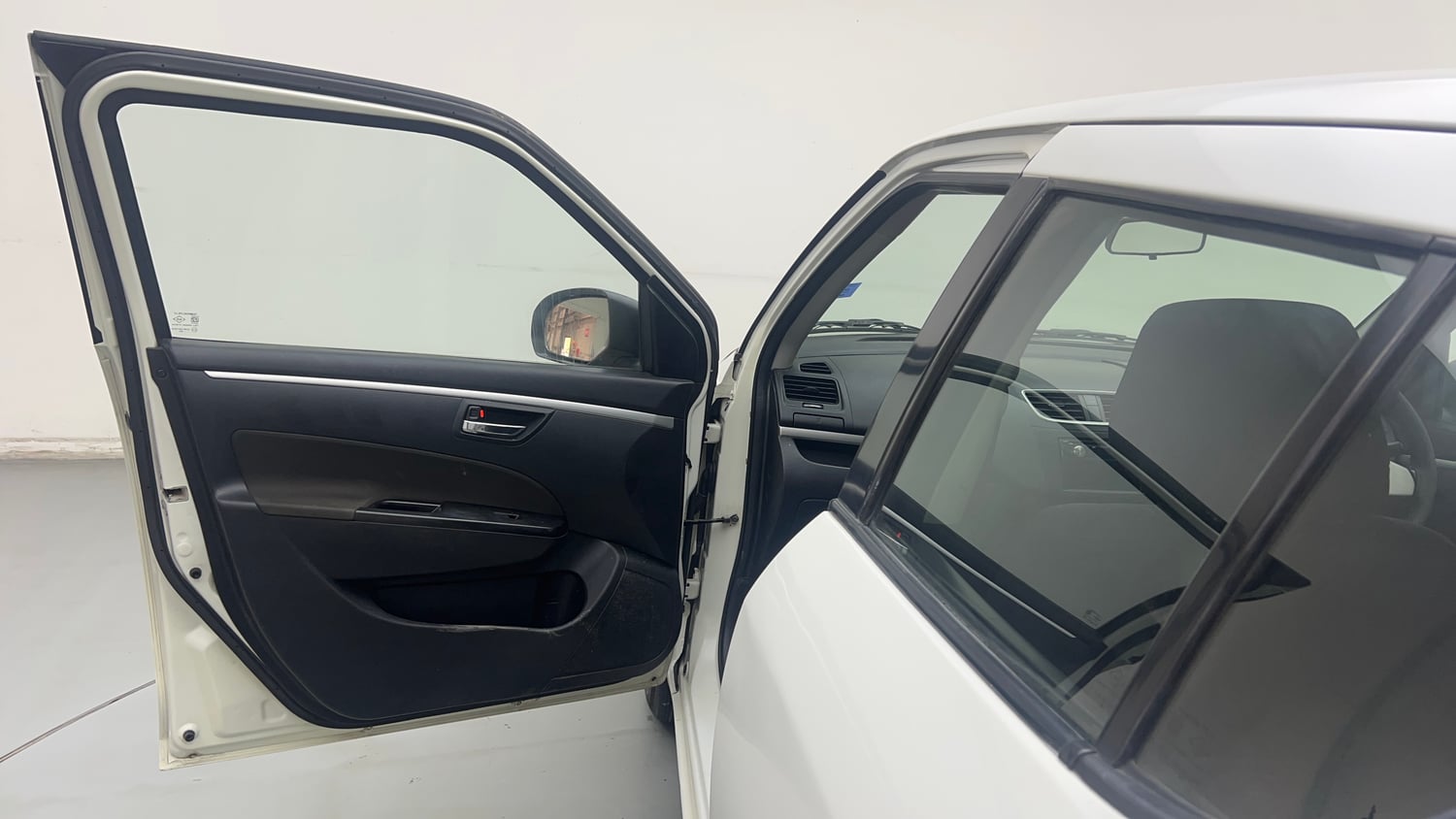 Used 2014 Maruti Suzuki Swift VXi Petrol Manual interior LEFT FRONT DOOR OPEN VIEW