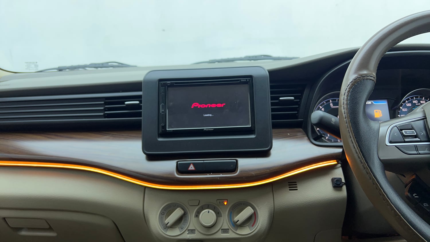 Used 2021 Maruti Suzuki New Ertiga VXi Petrol Manual top_features Integrated (in-dash) music system