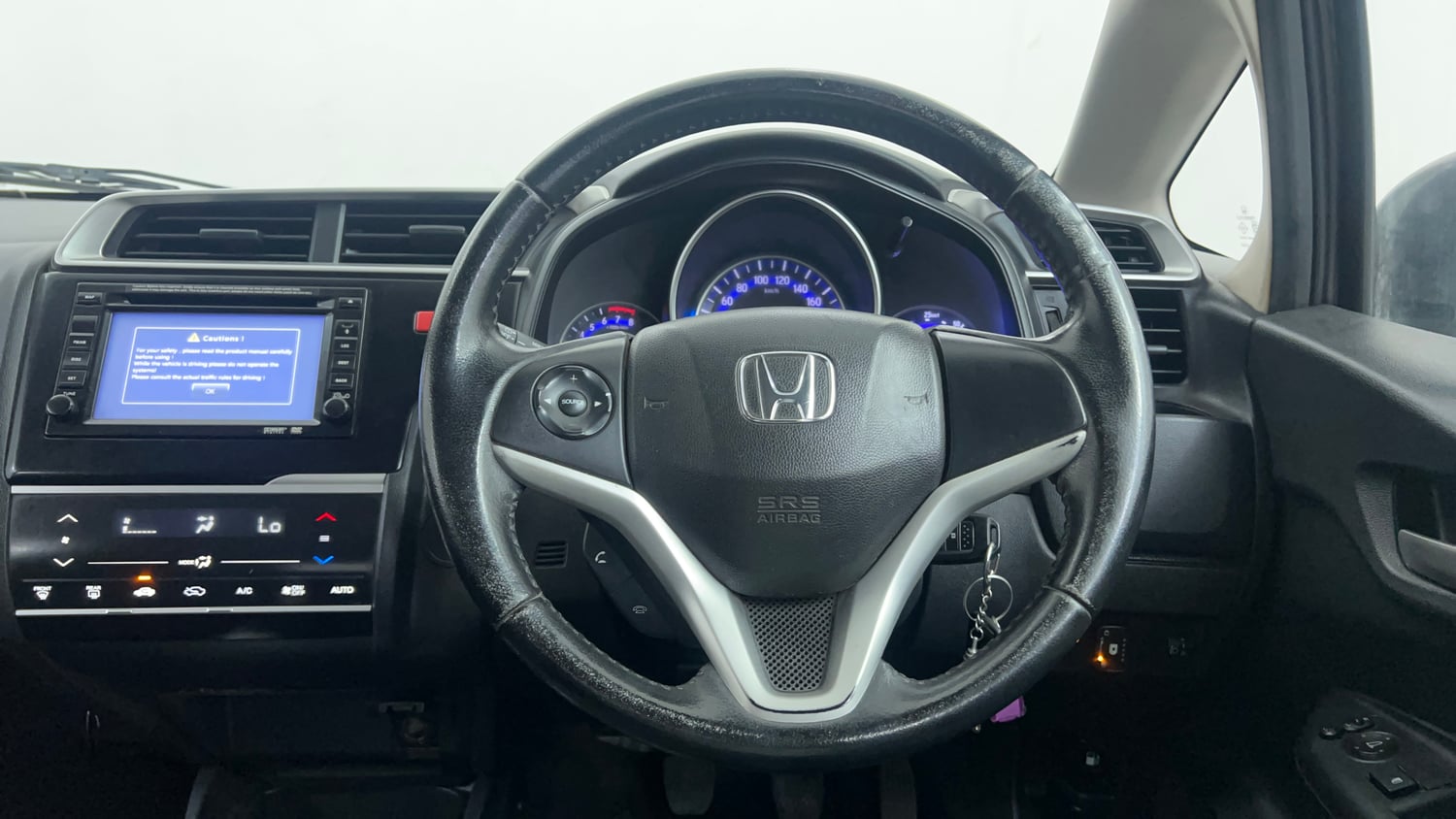 Used 2016 Honda Jazz VX Petrol+cng(outside fitted) Cng Manual interior STEERING VIEW