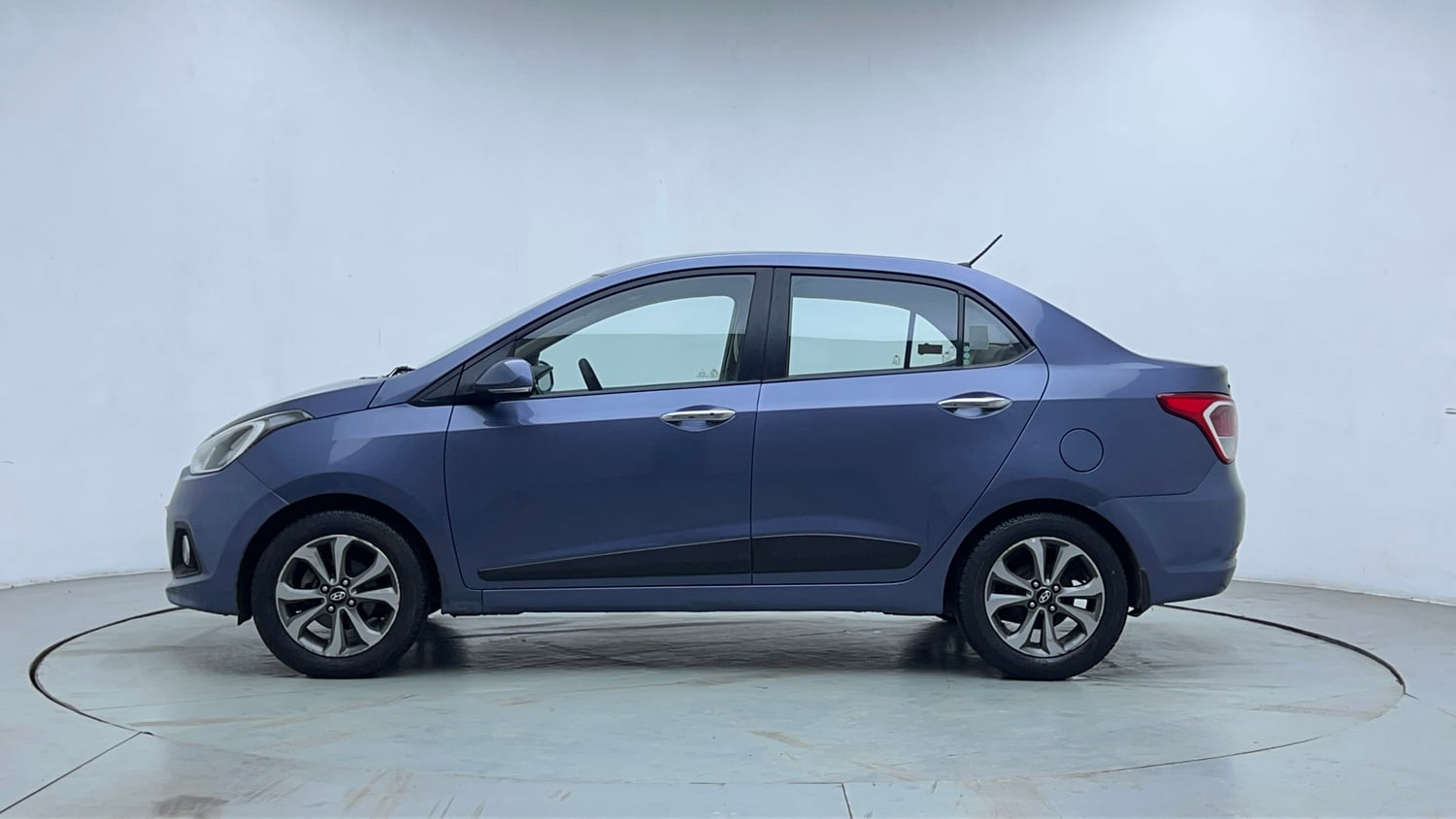 Used 2014 Hyundai Xcent S AT 1.2 (O) Petrol Automatic exterior LEFT SIDE VIEW