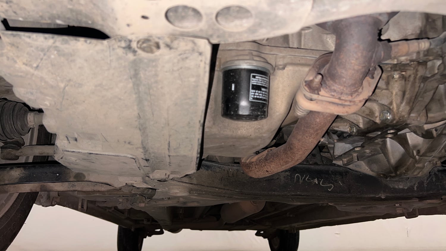 Used 2015 Maruti Suzuki Ertiga ZXi Petrol Manual extra FRONT LEFT UNDERBODY VIEW