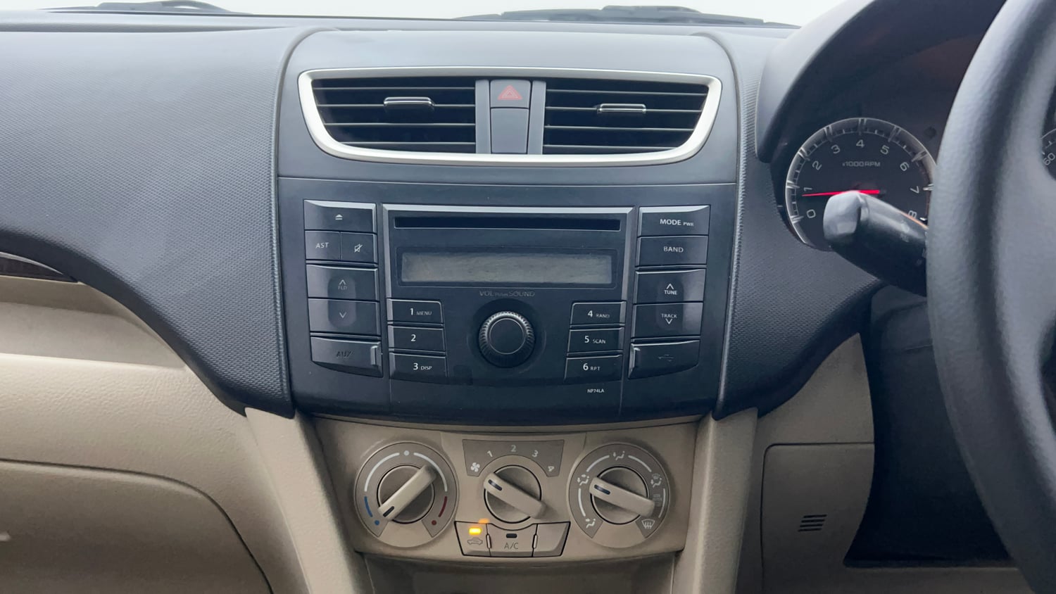 Used 2014 Maruti Suzuki Swift Dzire VXI Petrol Manual interior MUSIC SYSTEM & AC CONTROL VIEW