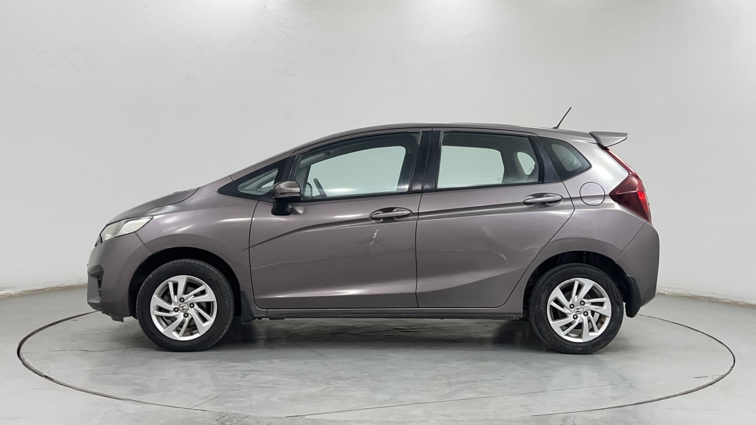 Used 2016 Honda Jazz VX Petrol+cng(outside fitted) Cng Manual exterior LEFT SIDE VIEW