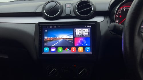 Used 2022 Maruti Suzuki Swift VXi AMT Petrol Automatic top_features Integrated (in-dash) music system