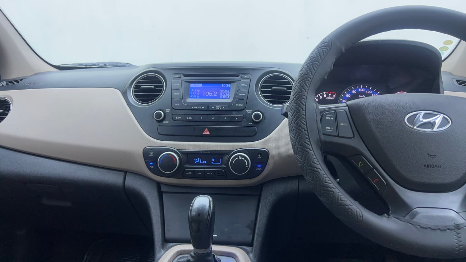 Used 2014 Hyundai Xcent S AT 1.2 (O) Petrol Automatic interior MUSIC SYSTEM & AC CONTROL VIEW
