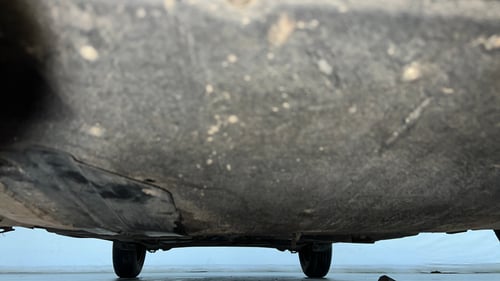 Used 2022 Maruti Suzuki Swift VXi AMT Petrol Automatic extra FRONT LEFT UNDERBODY VIEW