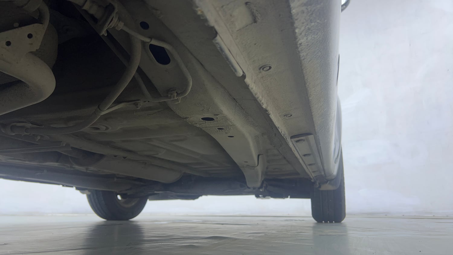 Used 2018 Maruti Suzuki Dzire ZXi Plus AMT Petrol Automatic extra REAR RIGHT UNDERBODY VIEW