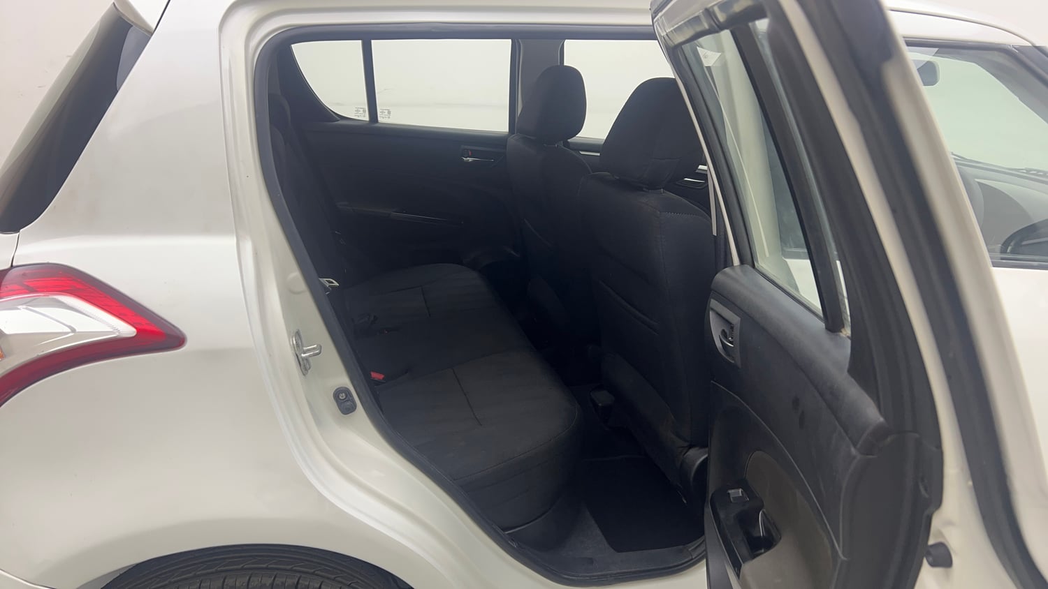 Used 2014 Maruti Suzuki Swift VXi Petrol Manual interior RIGHT SIDE REAR DOOR CABIN VIEW
