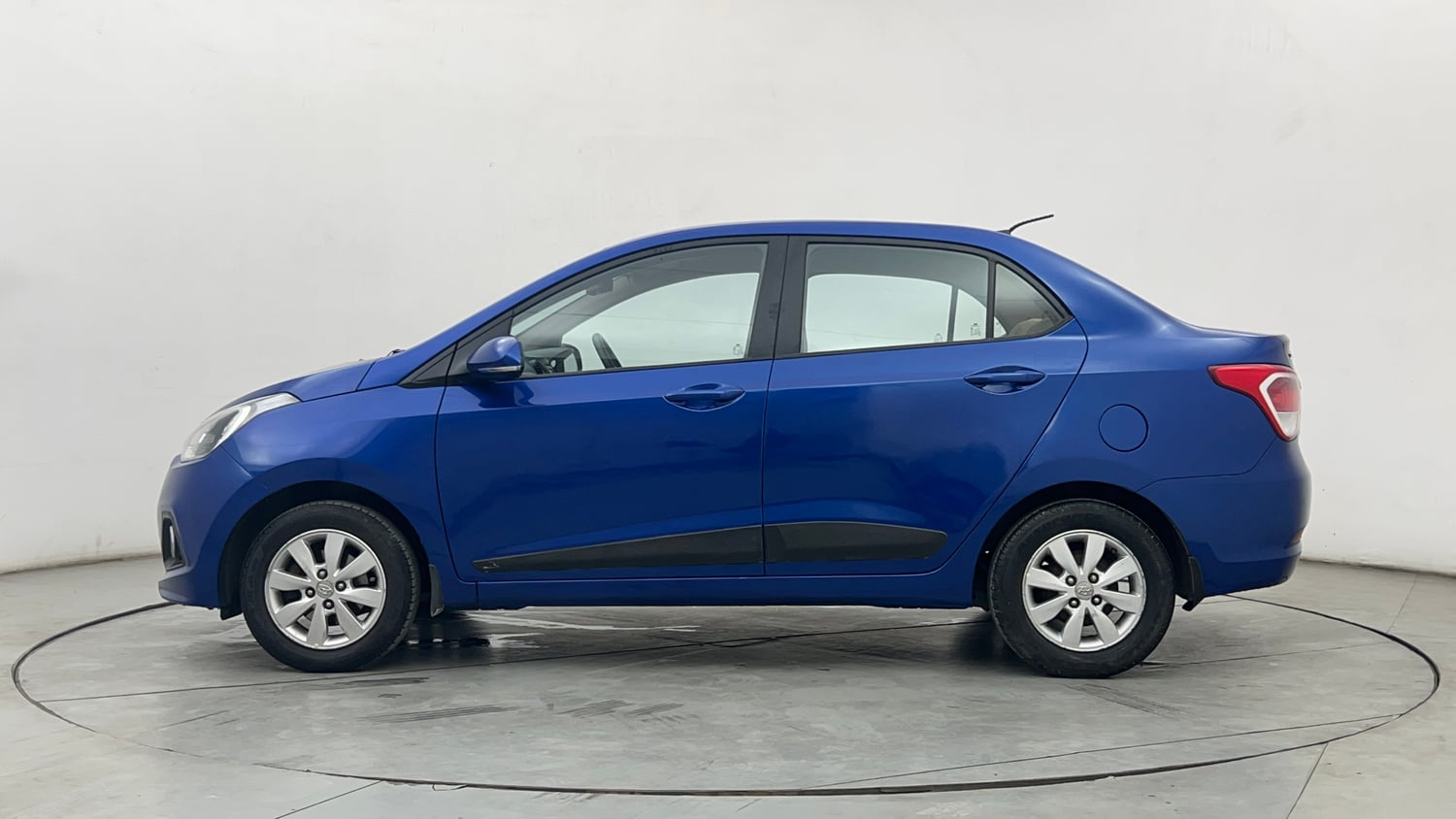 Used 2015 Hyundai Xcent S 1.2 (O) Petrol Manual exterior LEFT SIDE VIEW