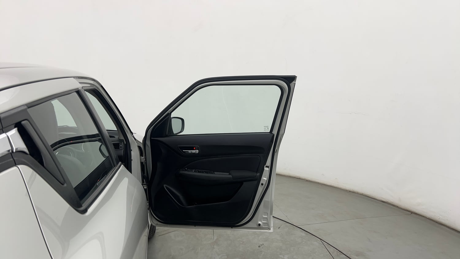 Used 2023 Maruti Suzuki Swift VXi Petrol Manual interior RIGHT FRONT DOOR OPEN VIEW