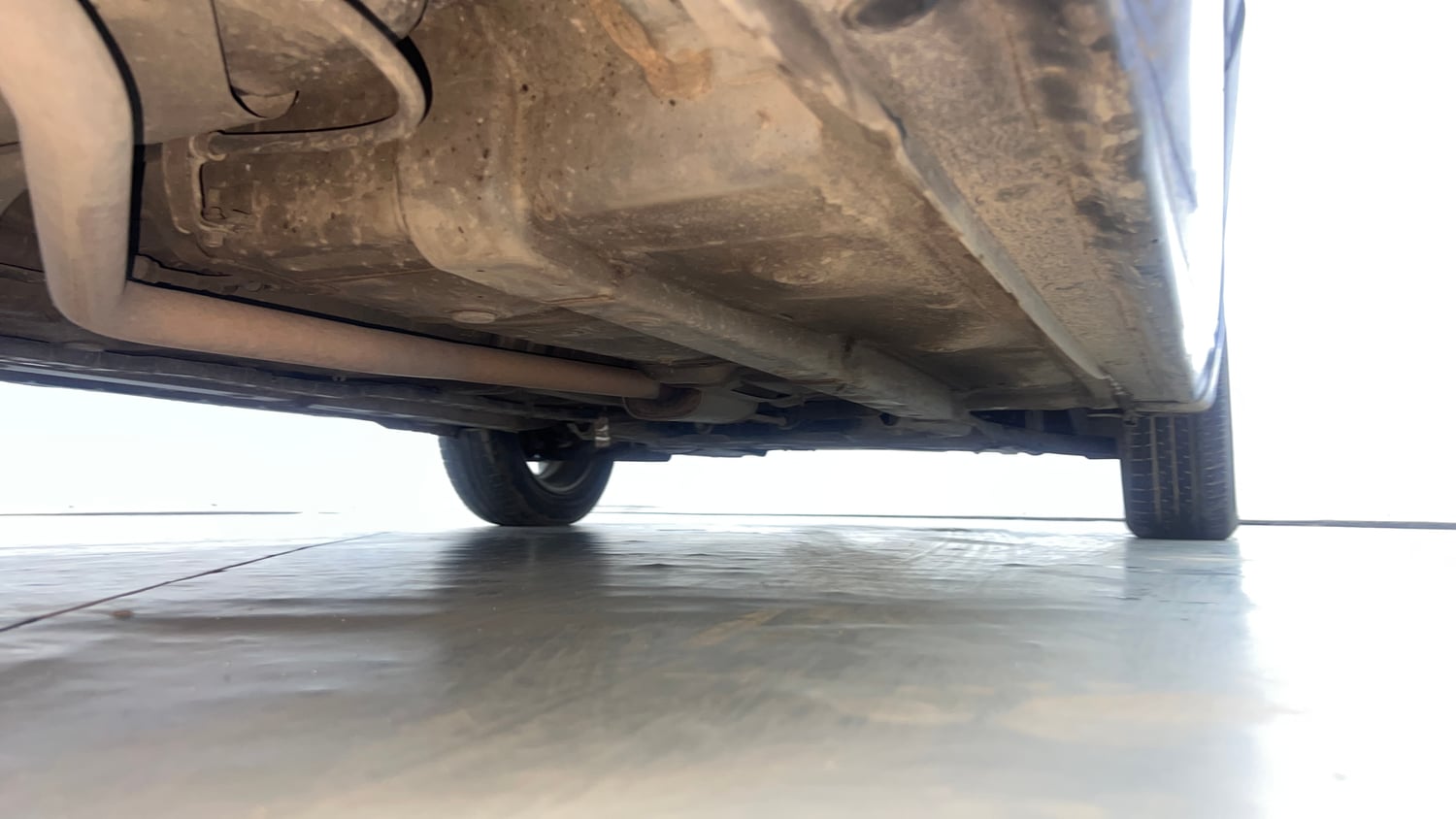 Used 2014 Hyundai Xcent S AT 1.2 (O) Petrol Automatic extra REAR RIGHT UNDERBODY VIEW