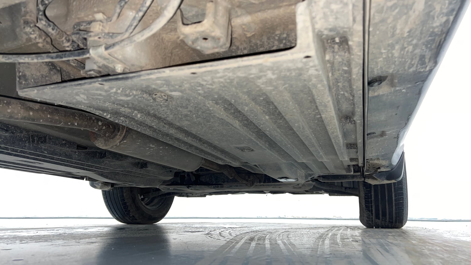 Used 2025 Maruti Suzuki Brezza VXi Petrol Manual extra REAR RIGHT UNDERBODY VIEW