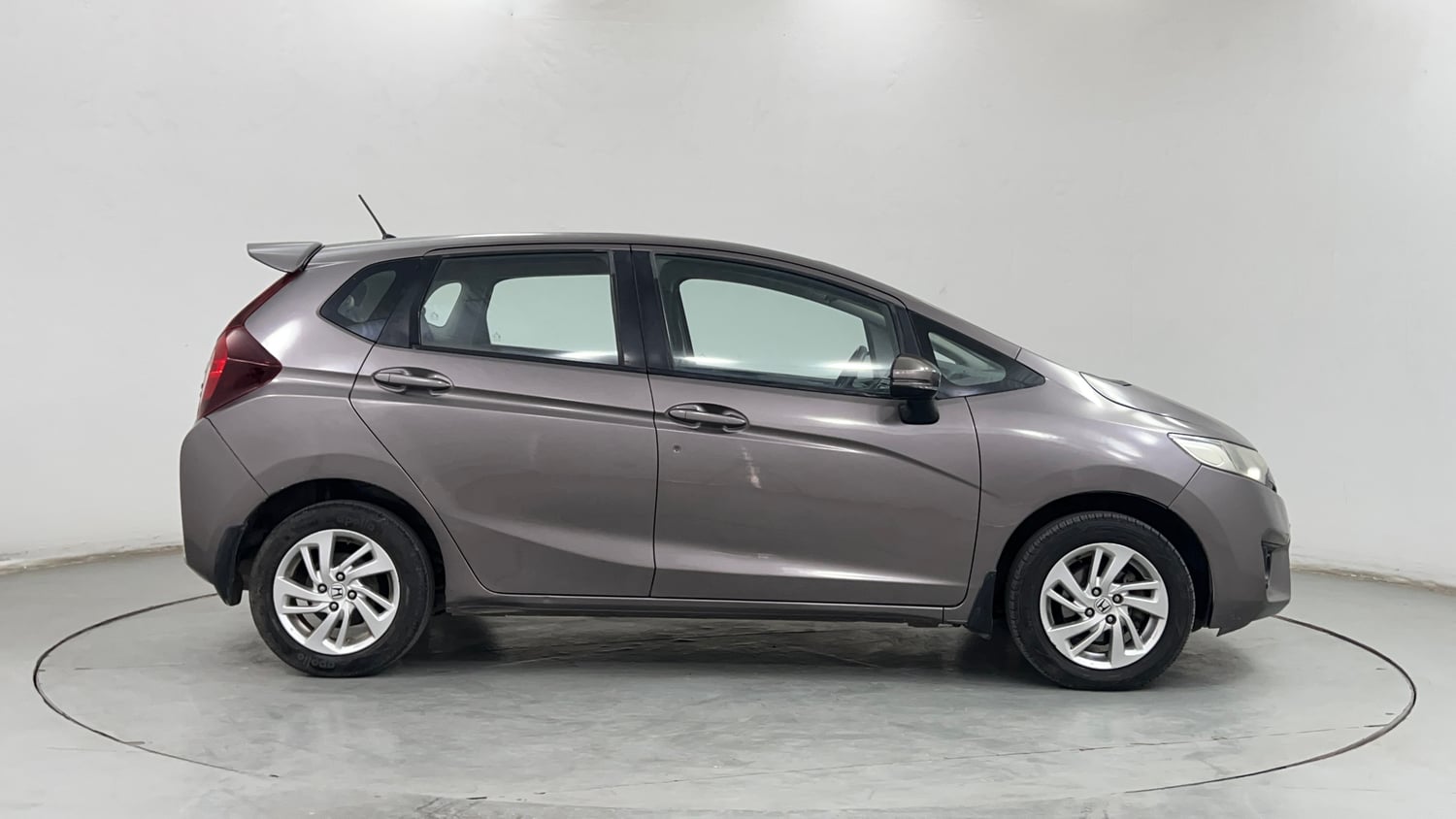 Used 2016 Honda Jazz VX Petrol+cng(outside fitted) Cng Manual exterior RIGHT SIDE VIEW