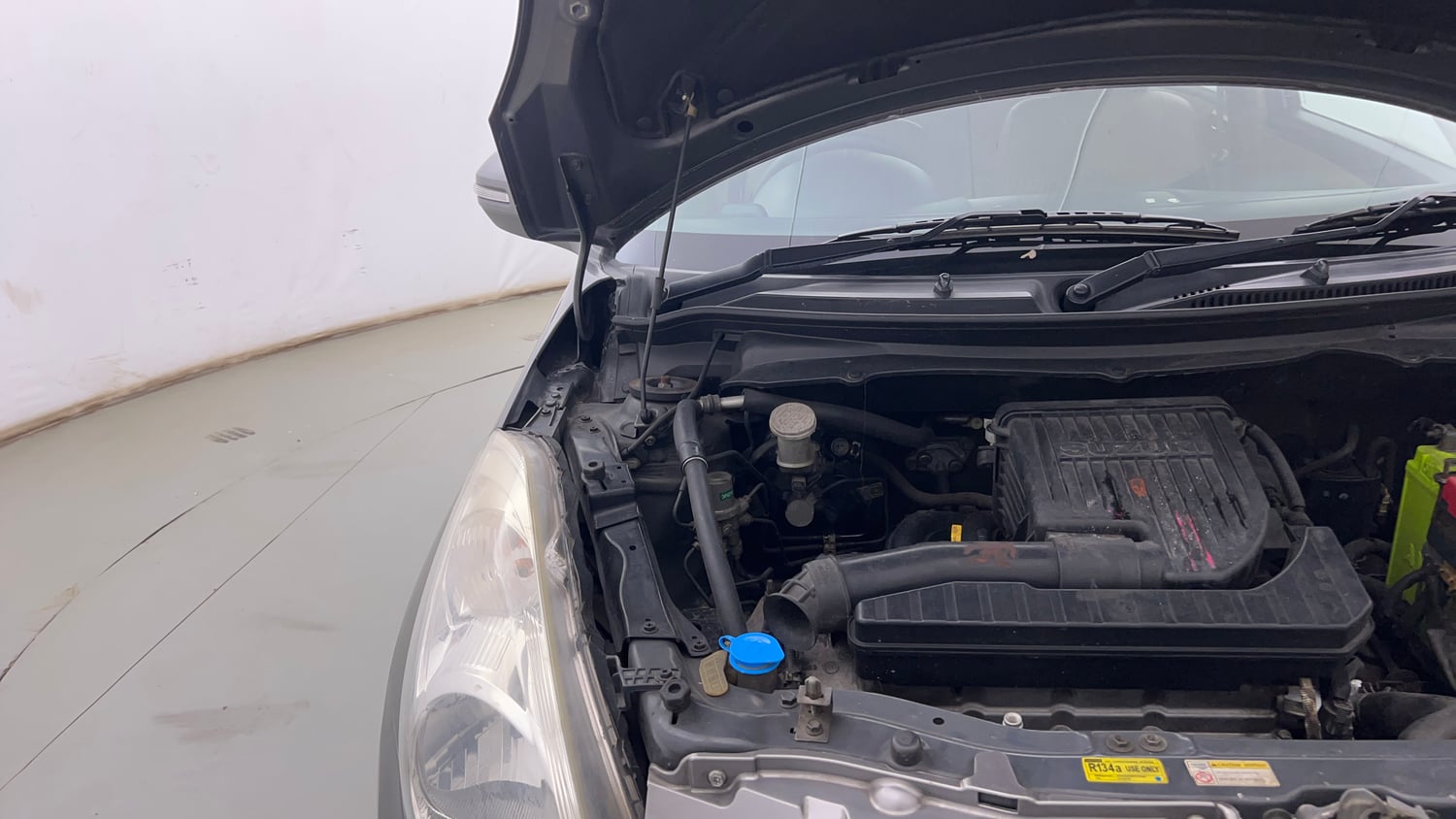 Used 2014 Maruti Suzuki Swift Dzire VXI Petrol Manual engine ENGINE RIGHT SIDE HINGE & APRON VIEW