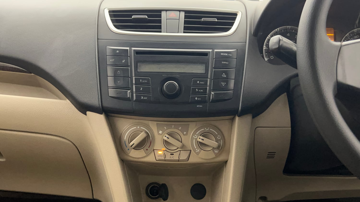 Used 2014 Maruti Suzuki Swift Dzire VXI Petrol Manual top_features Integrated (in-dash) music system