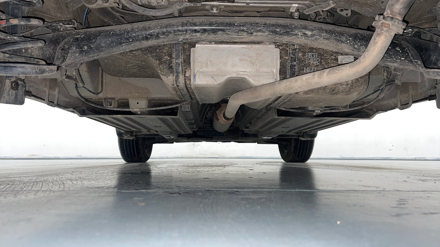 Used 2025 Maruti Suzuki Brezza VXi Petrol Manual extra REAR UNDERBODY VIEW (TAKEN FROM REAR)