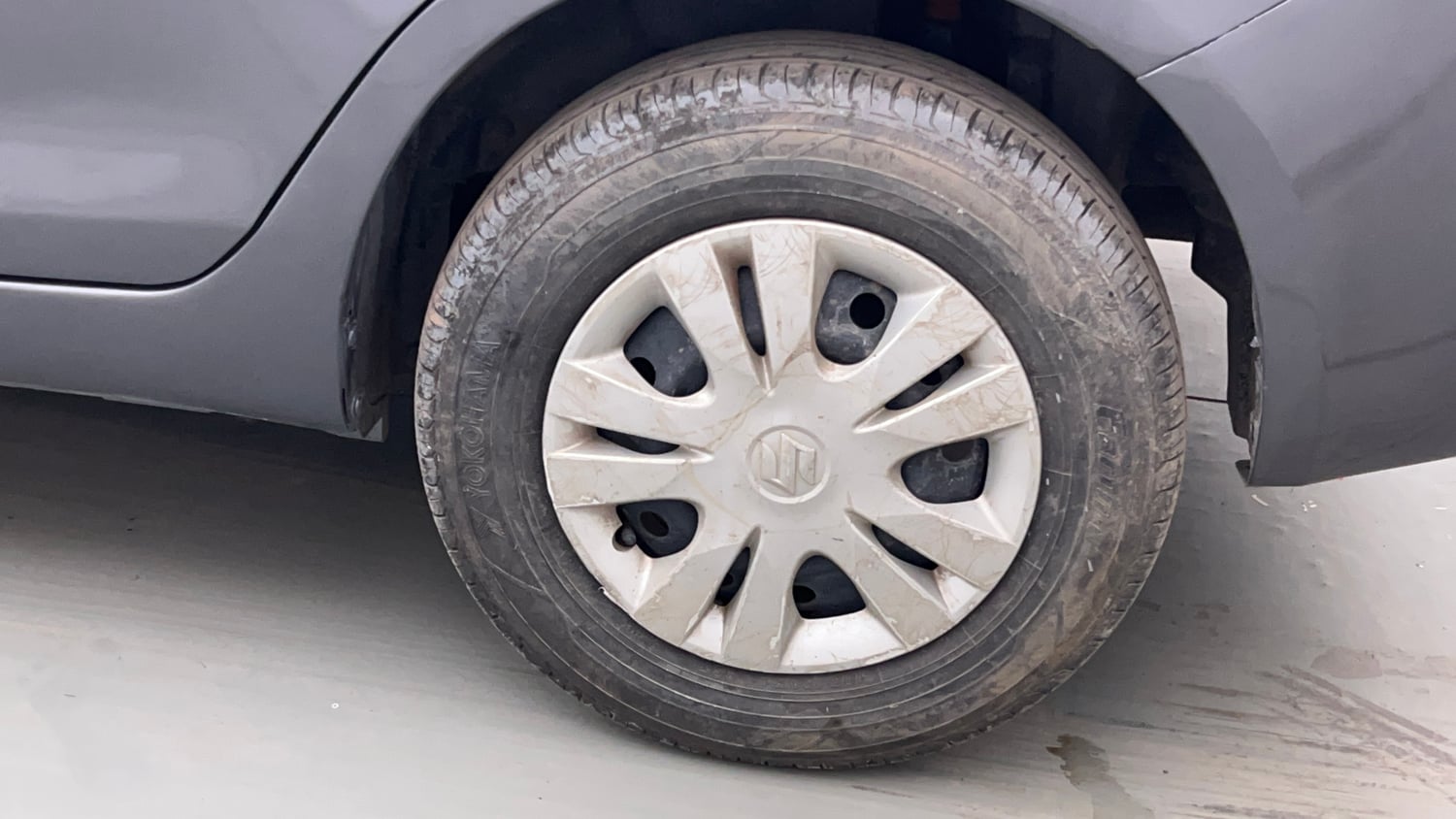 Used 2014 Maruti Suzuki Swift Dzire VXI Petrol Manual tyres LEFT REAR TYRE RIM VIEW