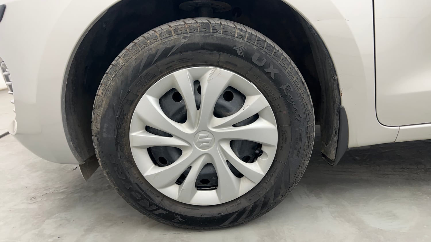 Used 2023 Maruti Suzuki Swift VXi Petrol Manual tyres LEFT FRONT TYRE RIM VIEW
