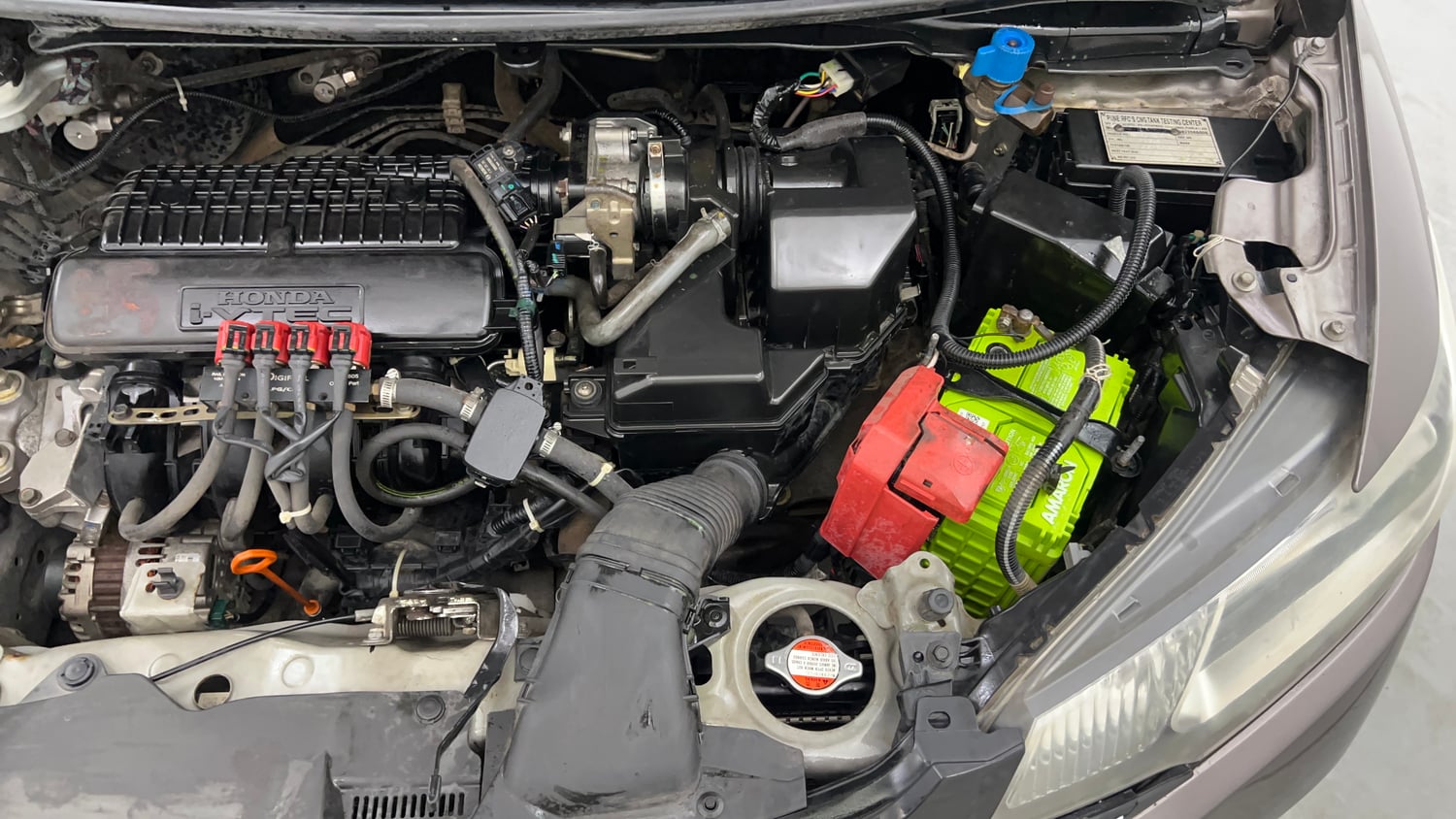 Used 2016 Honda Jazz VX Petrol+cng(outside fitted) Cng Manual engine ENGINE LEFT SIDE VIEW