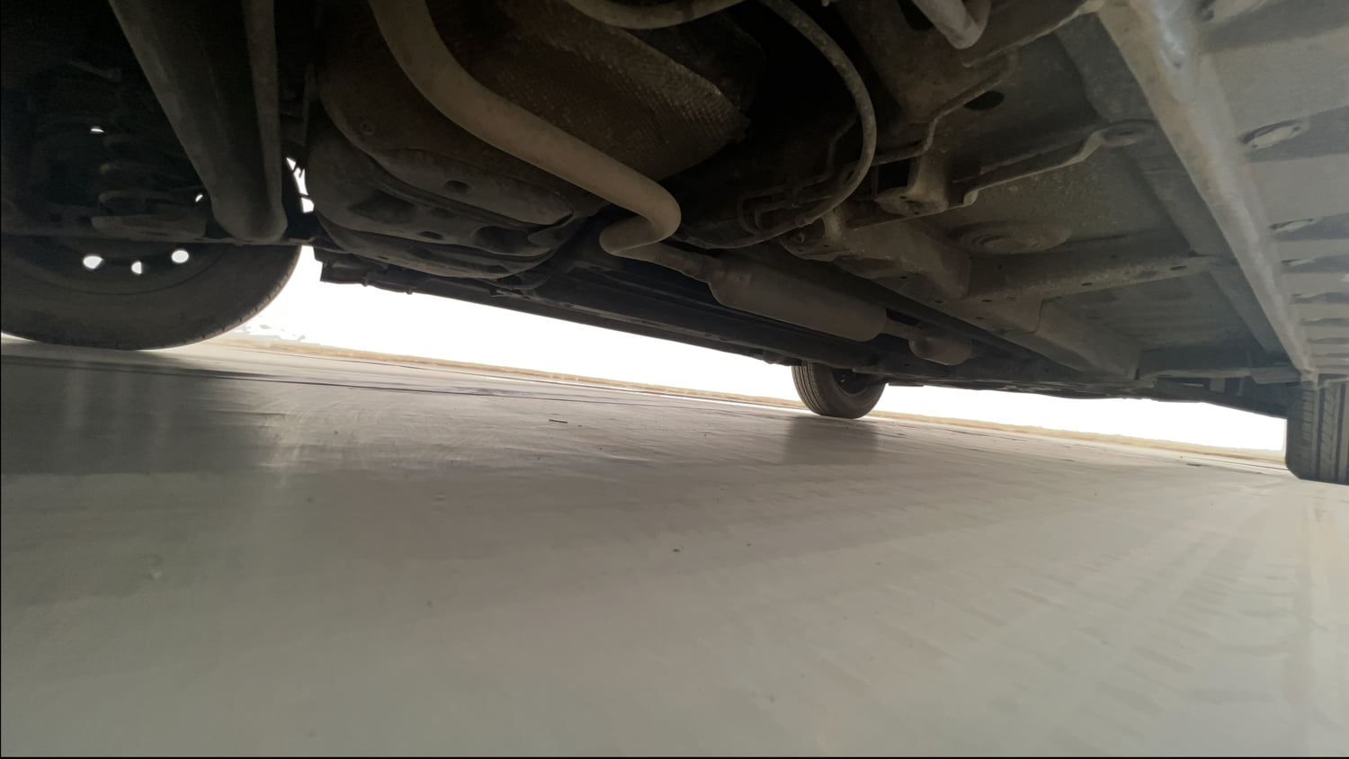 Used 2014 Maruti Suzuki Swift Dzire VXI Petrol Manual extra REAR RIGHT UNDERBODY VIEW