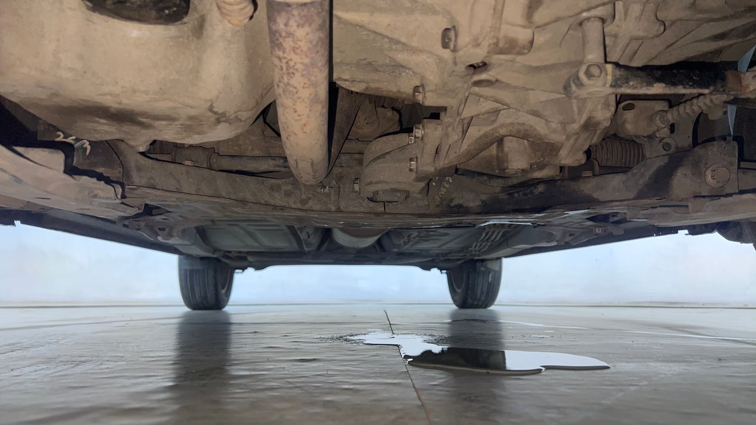Used 2017 Maruti Suzuki Baleno Zeta 1.2 Petrol Manual extra FRONT LEFT UNDERBODY VIEW