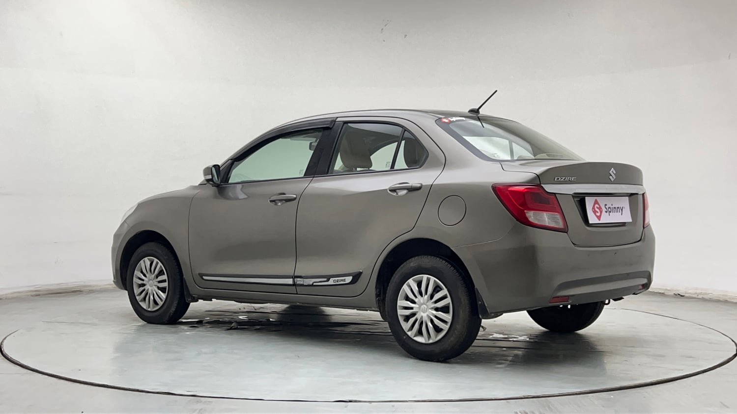 Used 2022 Maruti Suzuki Dzire VXi Petrol Manual exterior LEFT REAR CORNER VIEW